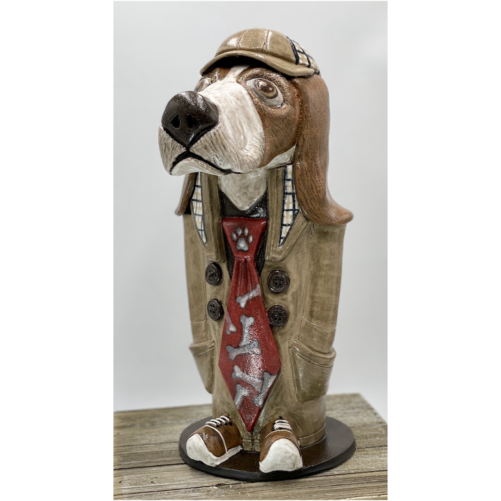 Hand built Ceramic Hound detective. 