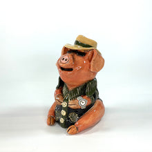 Load image into Gallery viewer, Denis Pig sculpture -Tourist ready for action 
